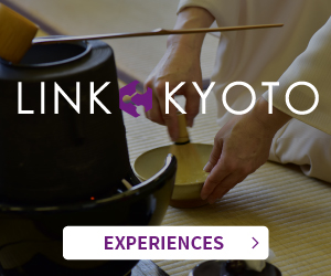Close-up of a woman in a kimono preparing tea, with the LINK KYOTO logo in the center and an EXPERIENCES button at the bottom; a banner for English speakers.